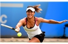 BIRMINGHAM, ENGLAND - JUNE 10:  Heather Watson of Great Britain in action during her first round match against Aleksandra Wozniak of Canada on day two of the Aegon Classic at Edgbaston Priory Club on June 10, 2014 in Birmingham, England.  (Photo by Tom Dulat/Getty Images)